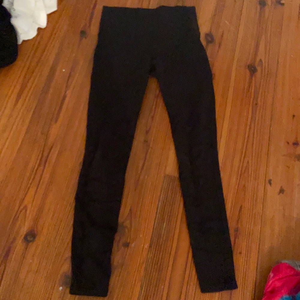 black leggings with mesh cutouts